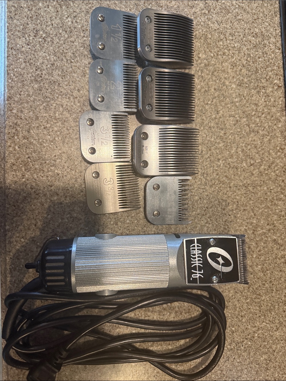 Oster Silver and Black Corded Hair Clipper with Guide Combs